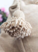 Coussin pompon beige coussin berbere